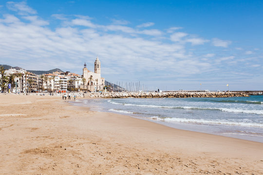 Panorama of the waterfront of Sitges with church, Spain