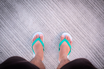 Foot, Beach sandal on the road.