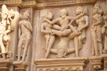 Sculptures of loving couples, illustrating the Kama Sutra