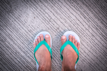 Foot, Beach sandal on the road.