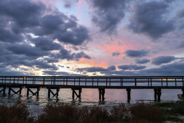 Obraz premium Fishing Pier At Sunrise