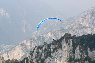 Paraglider flight over the mountains
