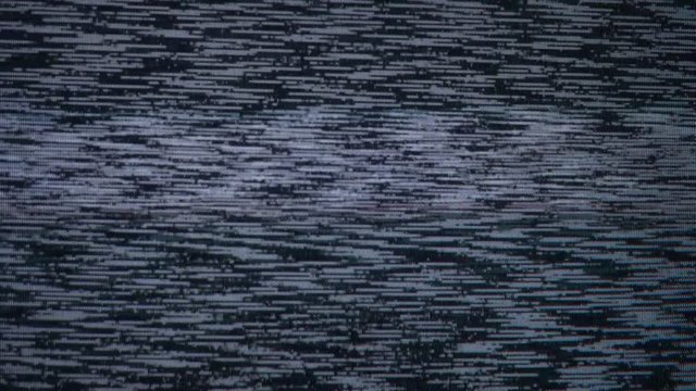 A flickering, analog TV signal. VHS retro recording video cassettes, TV channels. Screen Noise Static flicker. Noise Sound