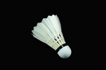 Fototapeta na wymiar badminton on a black background .