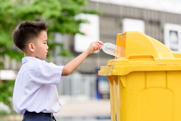 Boy trow the garbage
