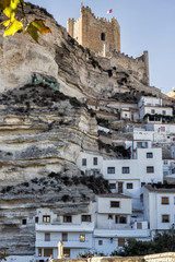 Side view of the village, on top of limestone mountain, Alcala del Jucar, Spain