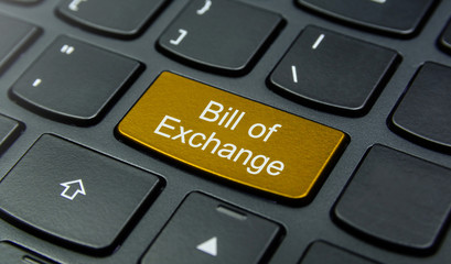 Business Concept: Close-up the Bill of Exchange button on the keyboard and have Gold, Yellow color button isolate black keyboard
