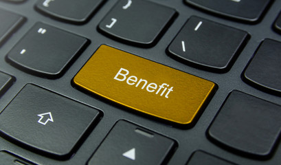 Business Concept: Close-up the Benefit button on the keyboard and have Gold, Yellow color button isolate black keyboard