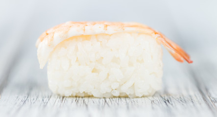 Sushi on a wooden table (selective focus)