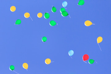 Balloons flying in the sky - red
