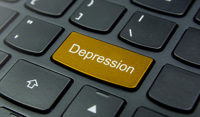 Business Concept: Close-up the Depression button on the keyboard and have Gold, Yellow color button isolate black keyboard