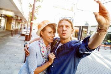 Smiling couple with the camera