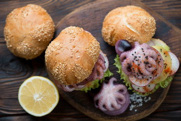 Above view of burgers with pulpo a la gallega stuffing, close-up
