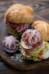 Close-up of burgers with spanish galician style octopuses