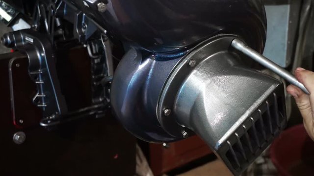 repairs and adjustment of the outboard water-jet motor
