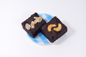 Pile of brownies isolated on white. brownies on white background. brownies almond.