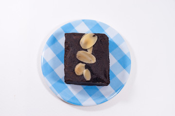 Pile of brownies isolated on white. brownies on white background. brownies almond.