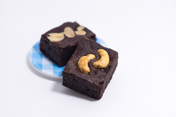 Pile of brownies isolated on white. brownies on white background. brownies almond.