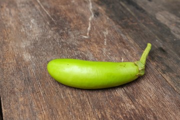 green eggplant fresh vegetable on a wooden table