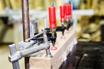 Fototapeta premium Bonding of wooden blanks. joinery