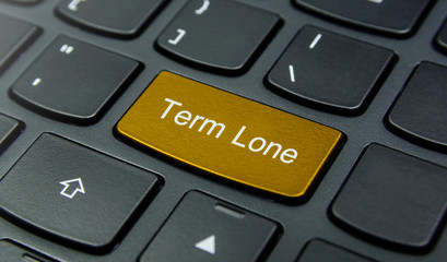 Business Concept: Close-up the Term Lone button on the keyboard and have Gold, Yellow color button isolate black keyboard