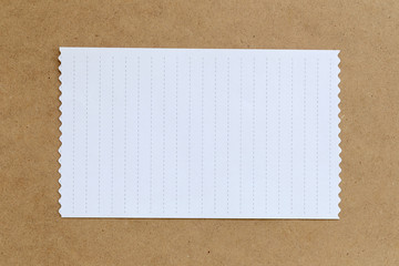 Fototapeta premium vintage of cardboard on brown background and copy specs.