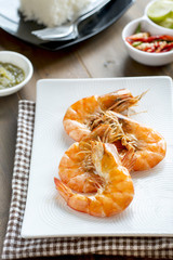 Cooked Prawns or Tiger Shrimps on wooden board