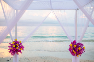 Fototapeta na wymiar Beautiful wedding arch on the beach in Thailand