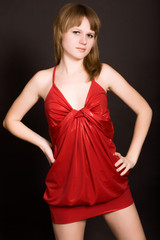 Fototapeta premium young girl in a red dress