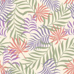Fototapeta premium Tropical background with palm leaves. Seamless floral pattern