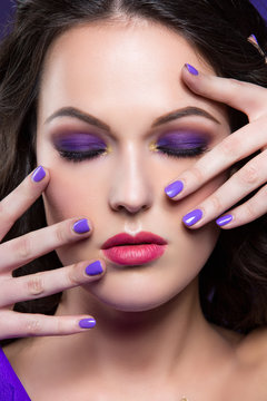 Brunette girl with purple make-up
