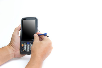 Male hands using a hand held barcode scanner Enterprise Digital Assistant computer.