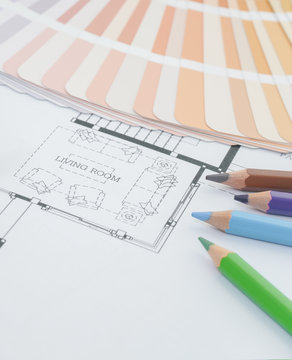 colors and material samples on architectural drawings of the modern house