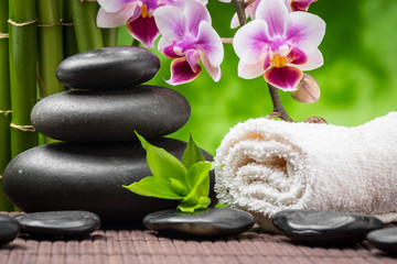 spa still life with zen basalt stones ,orchid and bamboo