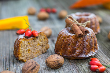 Pumpkin cake with cinnamon, rose hip and autumn leav