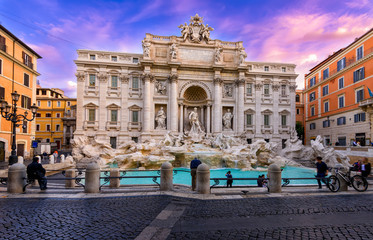 Sunrise view of Rome Trevi Fountain (Fontana di Trevi) in Rome, Italy. Trevi is most famous fountain of Rome. Architecture and landmark of Rome