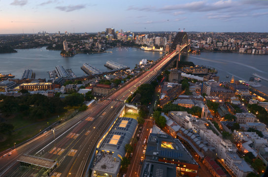 Aerial view at dusk of Sydney Harbour Bridge