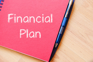 Financial plan text concept on notebook