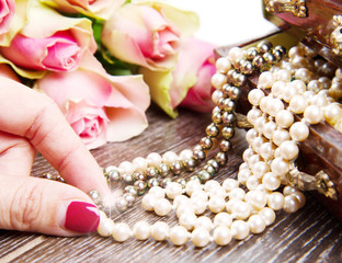 jewelry box with jewelry  with pink roses