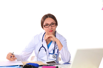 Young woman doctor examines the X-rays. Isolate