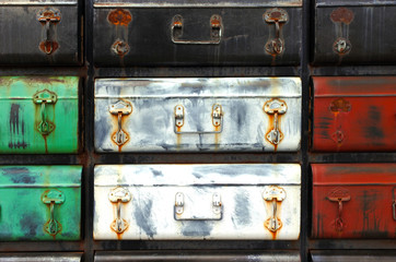 Old colourful suitcases background