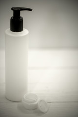 Fototapeta na wymiar Jars for cosmetics on a white background
