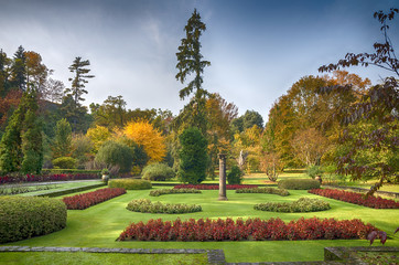 Italian garden in Autumn. Idyllic botanical garden of Villa Taranto by Lago Maggiore during Fall,...