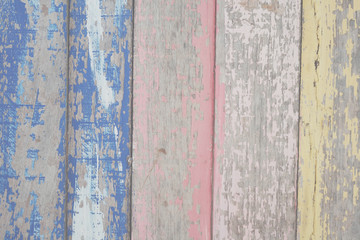 pastel colored wooden background.
