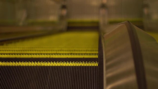 Moving Escalator Up, Mecanic, Electric, Stair and Escalators in a Public Area. HD Footage 1080, Slow Mo