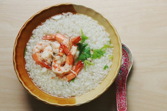 Thai Rice Soup With Shrimp (Khao Tom Goong)  in bowl