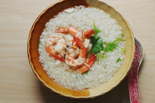 Thai Rice Soup With Shrimp (Khao Tom Goong)  in bowl