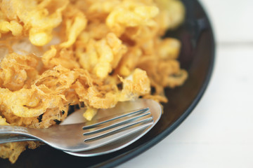 Egg omelette on dark plate