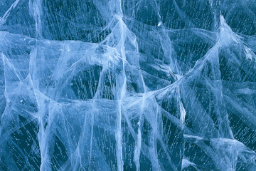 Natural ice and cracks on the surface of Lake Baikal