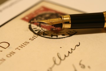 Fountain pen and old post card